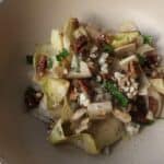 Endive salad with Gorgonzola, spiced pecans, and strawberry balsamic dressing