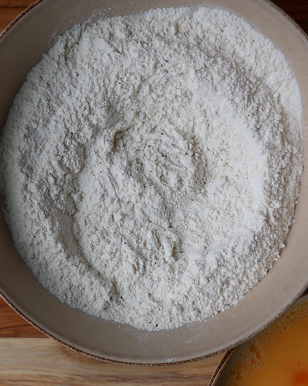 Whisking flour with salt and pepper