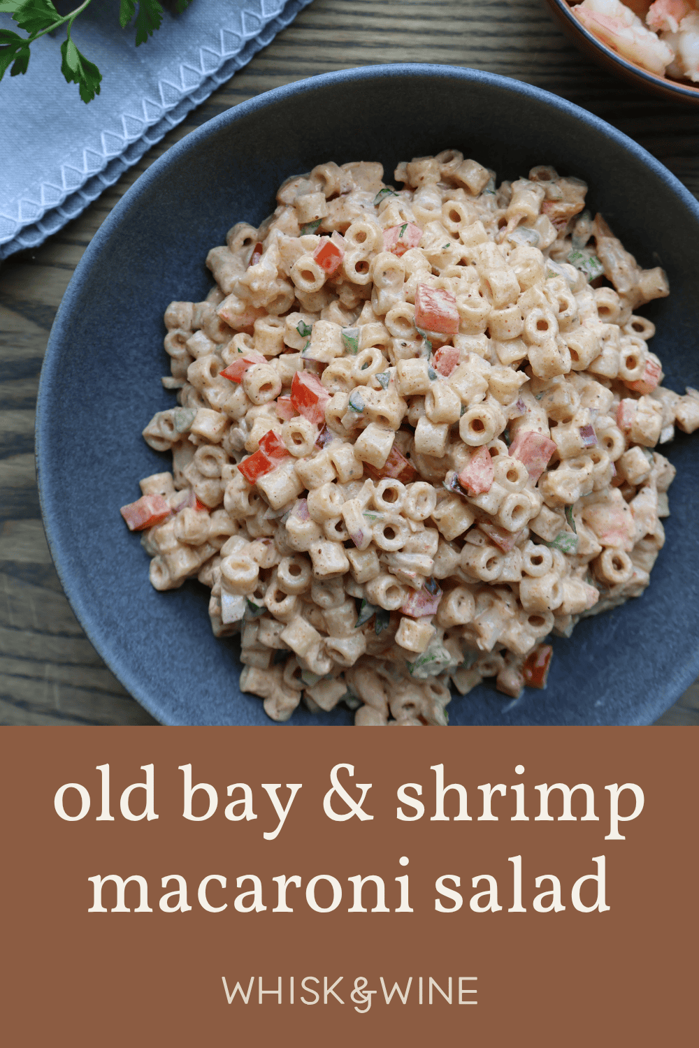 Old Bay Shrimp Macaroni Salad Pinterest pin with recipe title and bowl photo