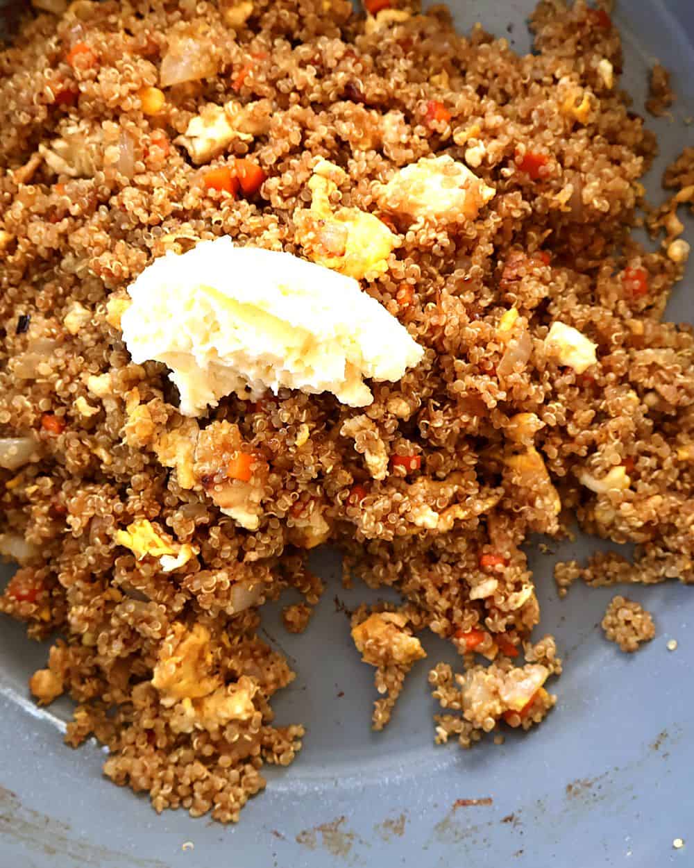 Garlic butter melting into the quinoa fried rice