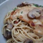 Chicken marsala pasta with mascarpone cream sauce in a bowl