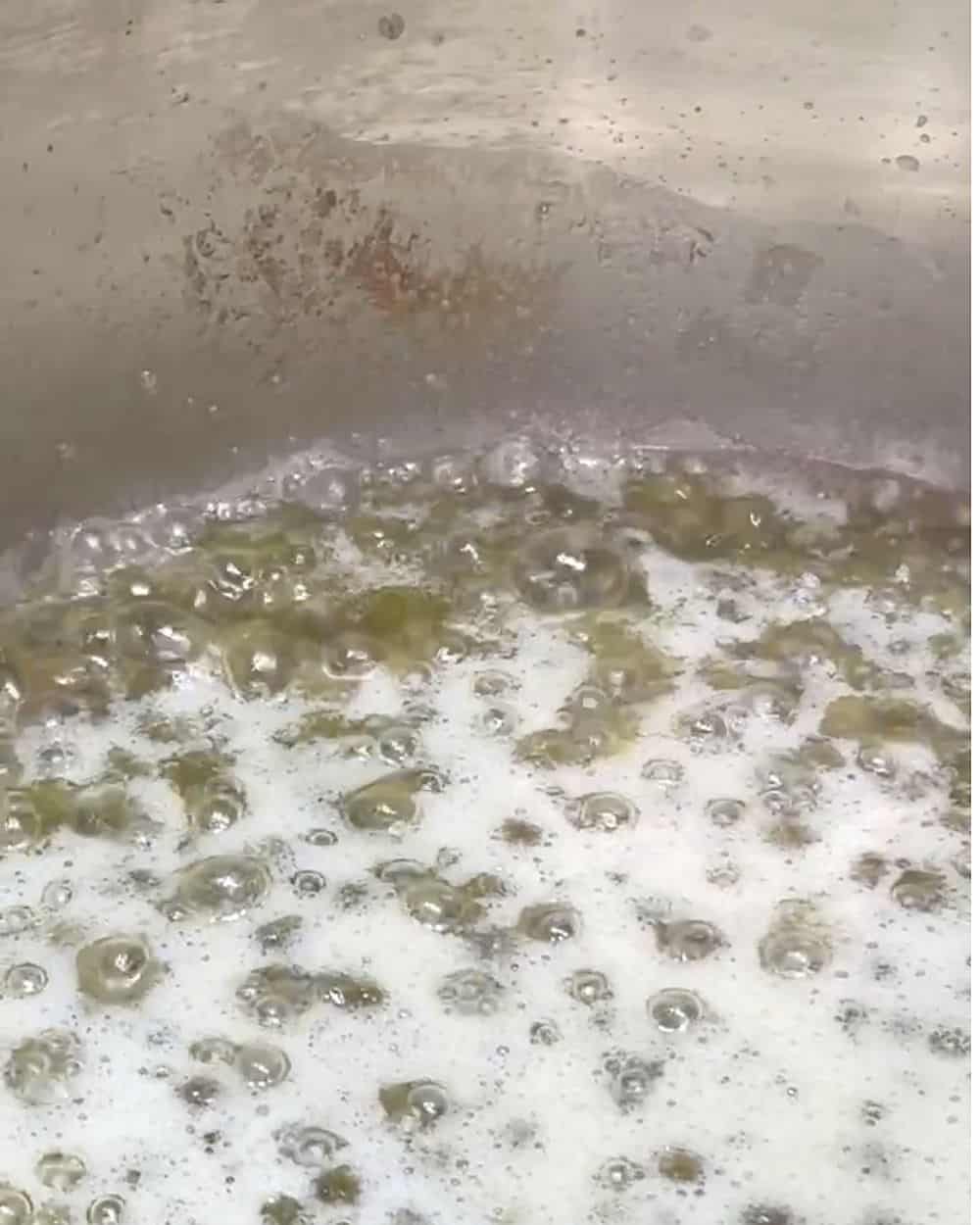 Butter browning with capers in a pan for caper brown butter
