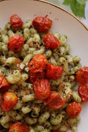 Tomato pesto pasta with garlic breadcrumbs and chili oil