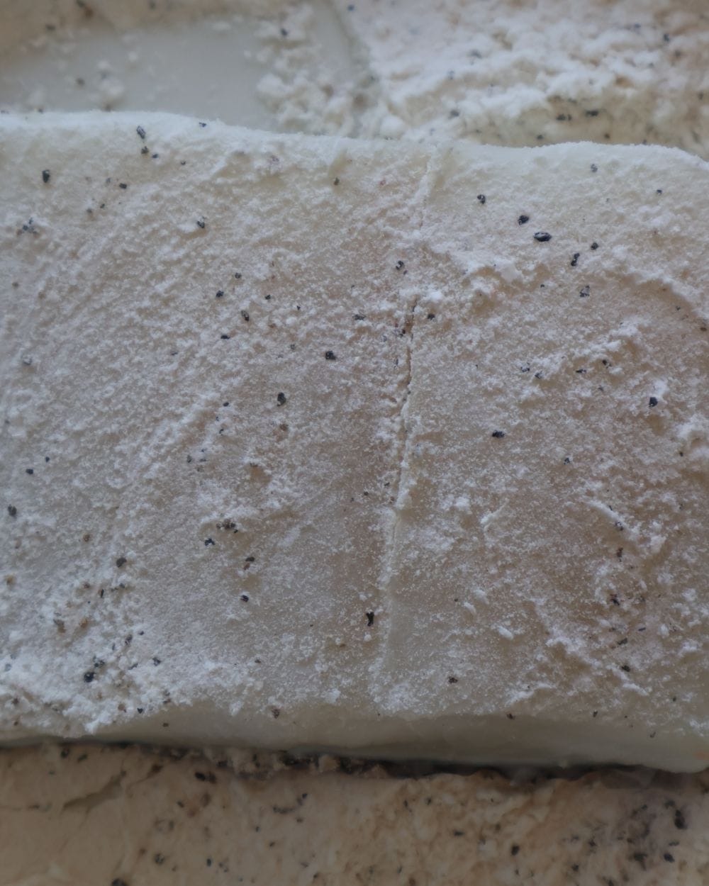 Chilean sea bass fillets dredged in seasoned flour